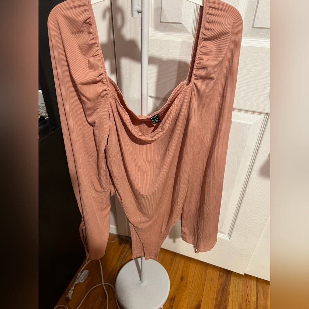 Pink body suit shirt
